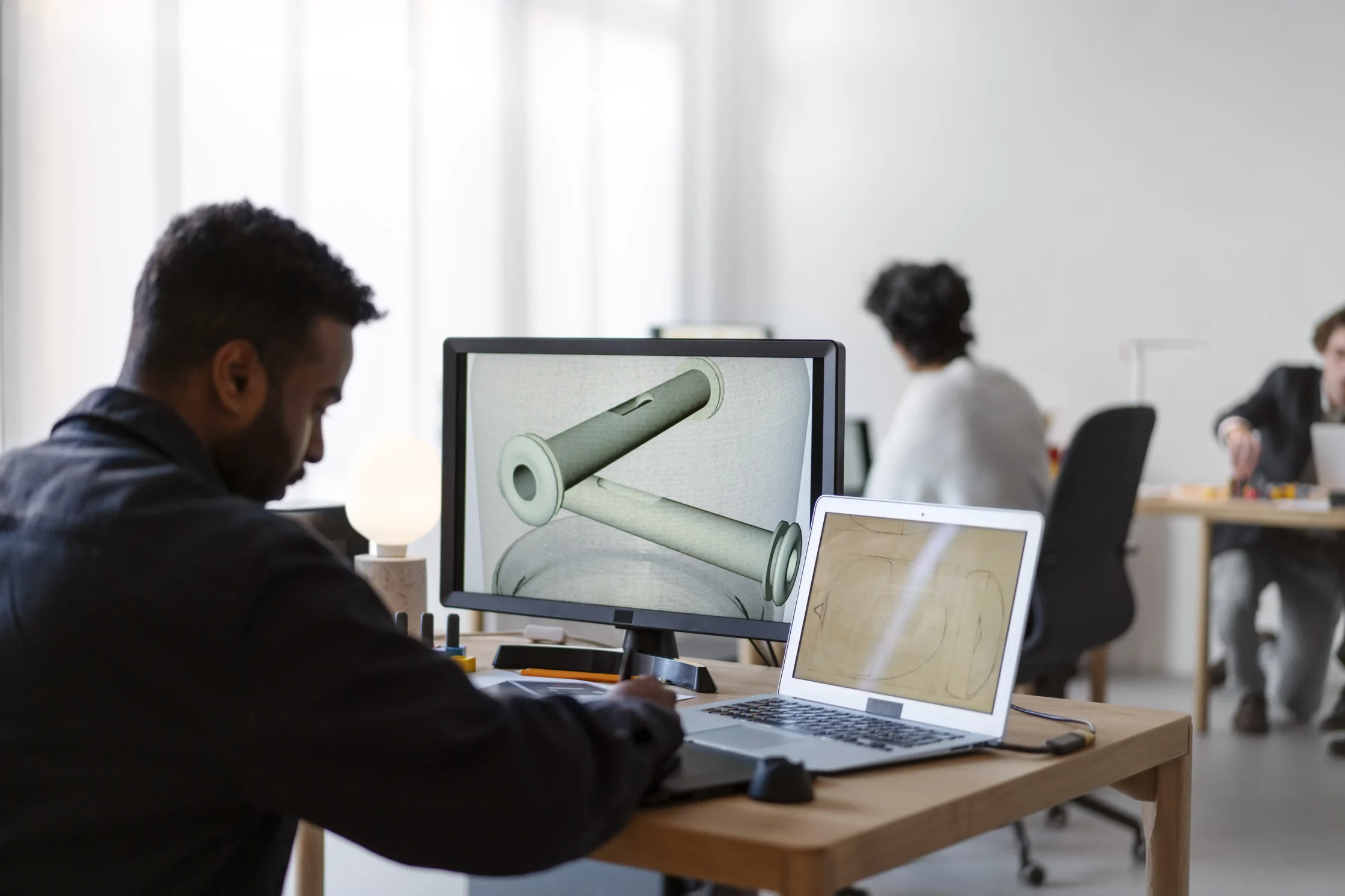 designers team working 3d model